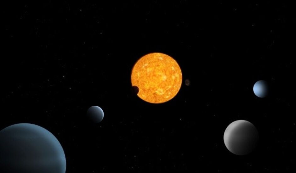 TOI-178, ao centro, e os seis planetas que a orbitam são representados nesta ilustração