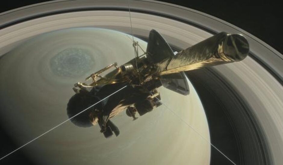 Imagem de divulgação da Nasa mostra ilustração da sonda Cassini sobre os anéis do hemisfério norte de Saturno